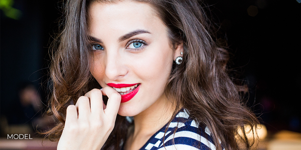 Close up portrait of beautiful smiling young woman