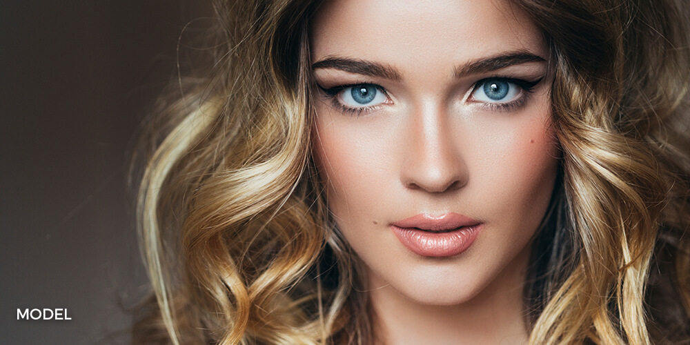 dermal fillers michigan Close up portrait of beautiful smiling young woman