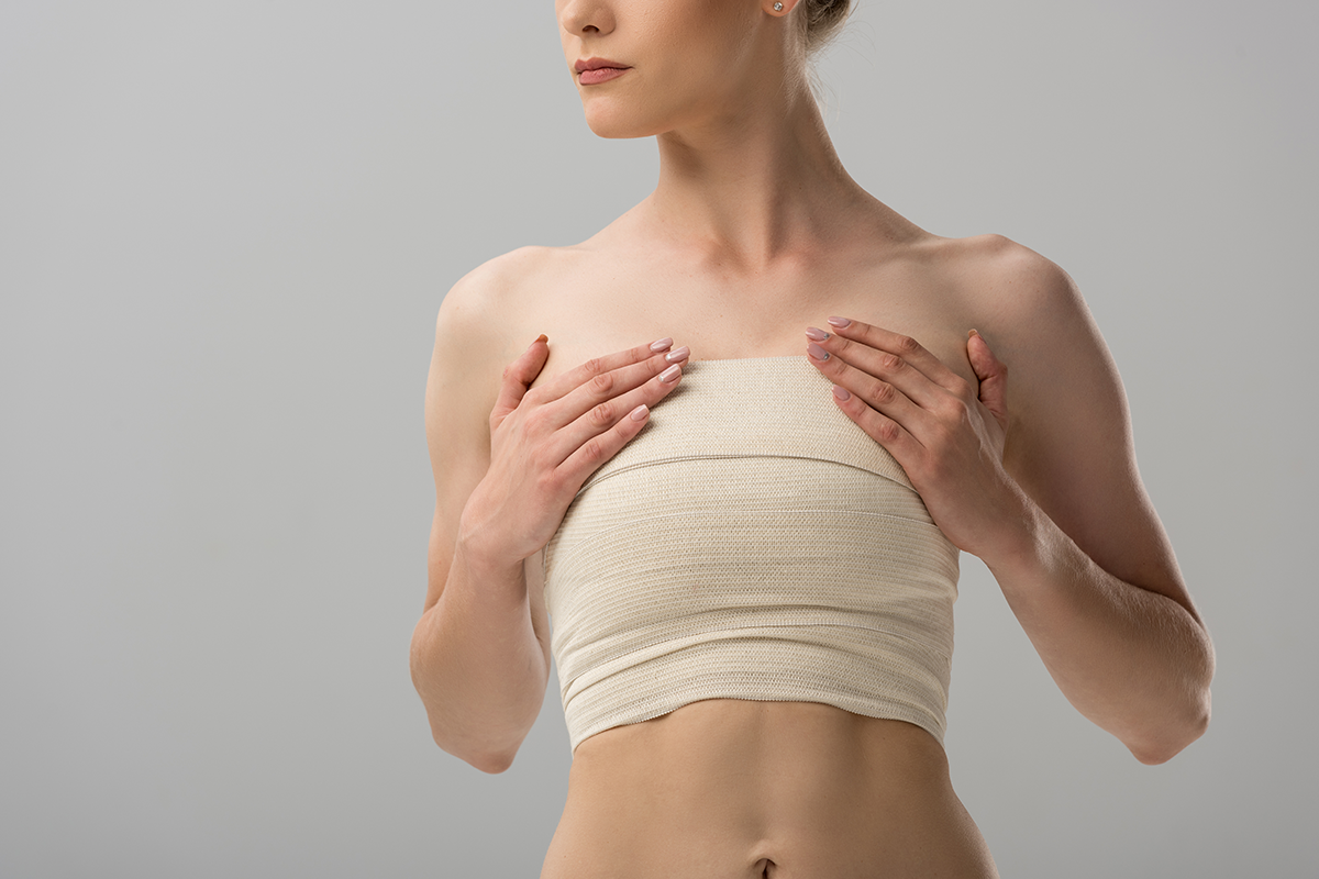 woman with breast bandage